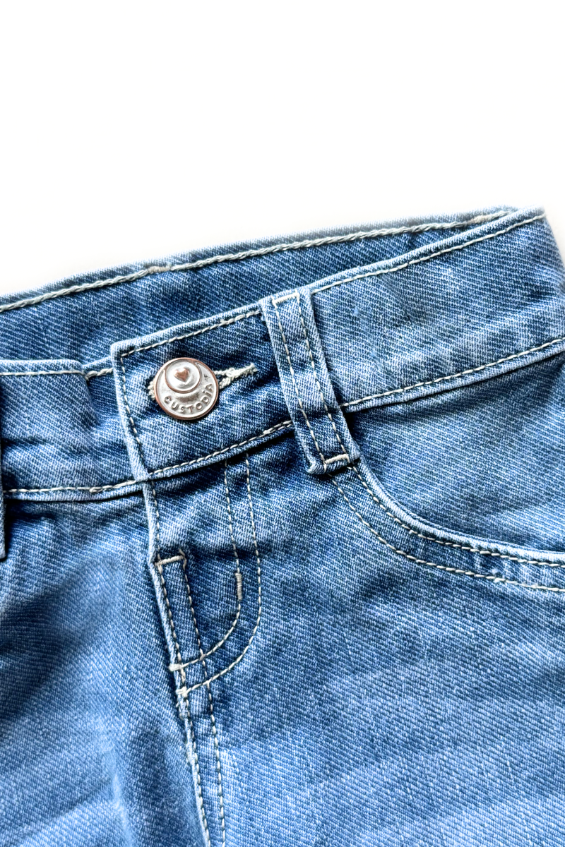 Set 2 Prendas Blusa en Ojalillo Jean con Bota Bordada